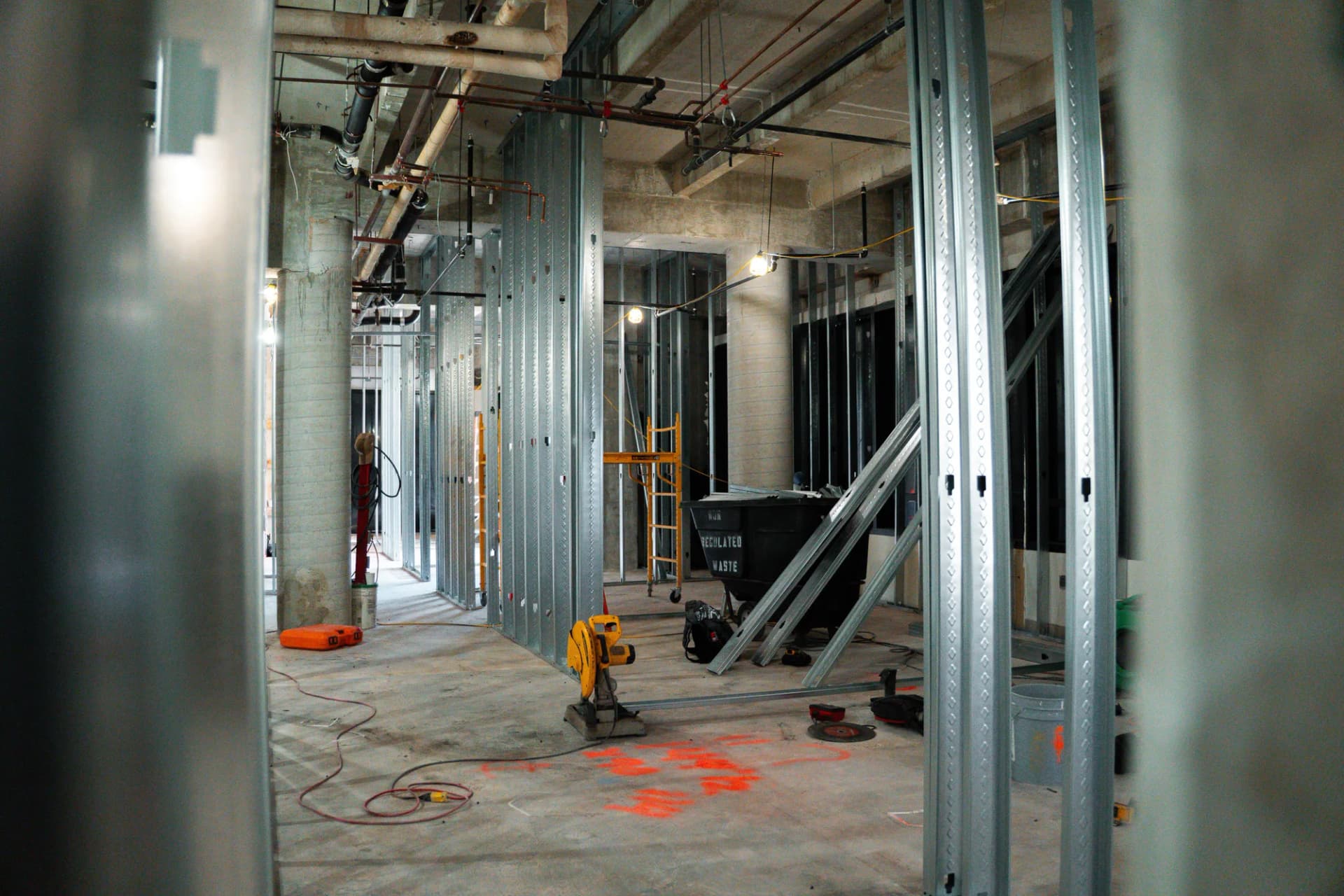 Metal stud framing along an interior corridor at Bascom Palmer
